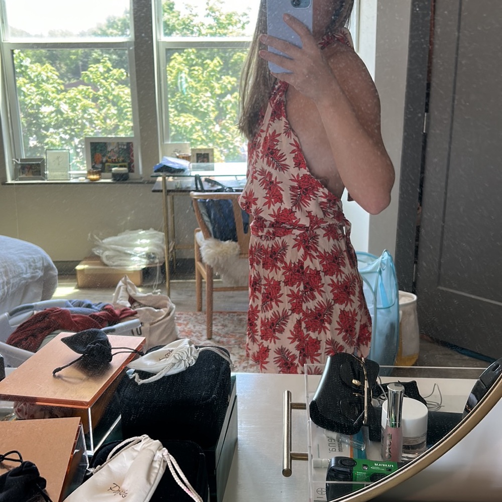Floral printed romper with low open back & halter top